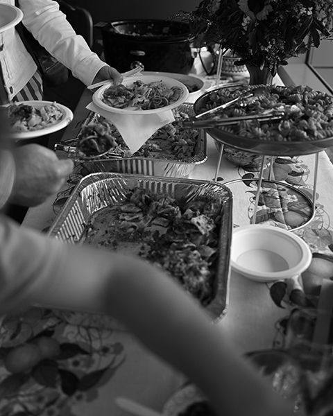 Home group members sharing a meal and fellowship